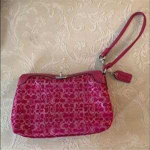 Pink coach fabric and leather wristlet